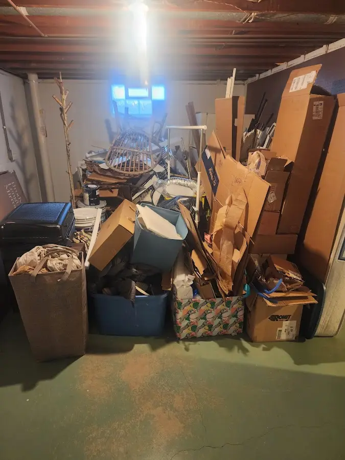 Roll-off dumpster container at job site for 15 Yard Dumpster Rental in River Road